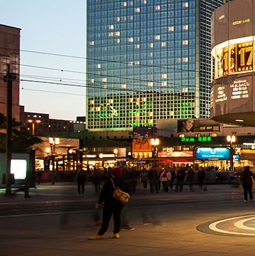Mountain massif, sunbathed, partly covered in show.