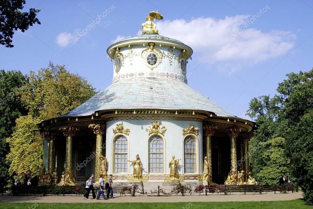 Mountain massif, sunbathed, partly covered in show.