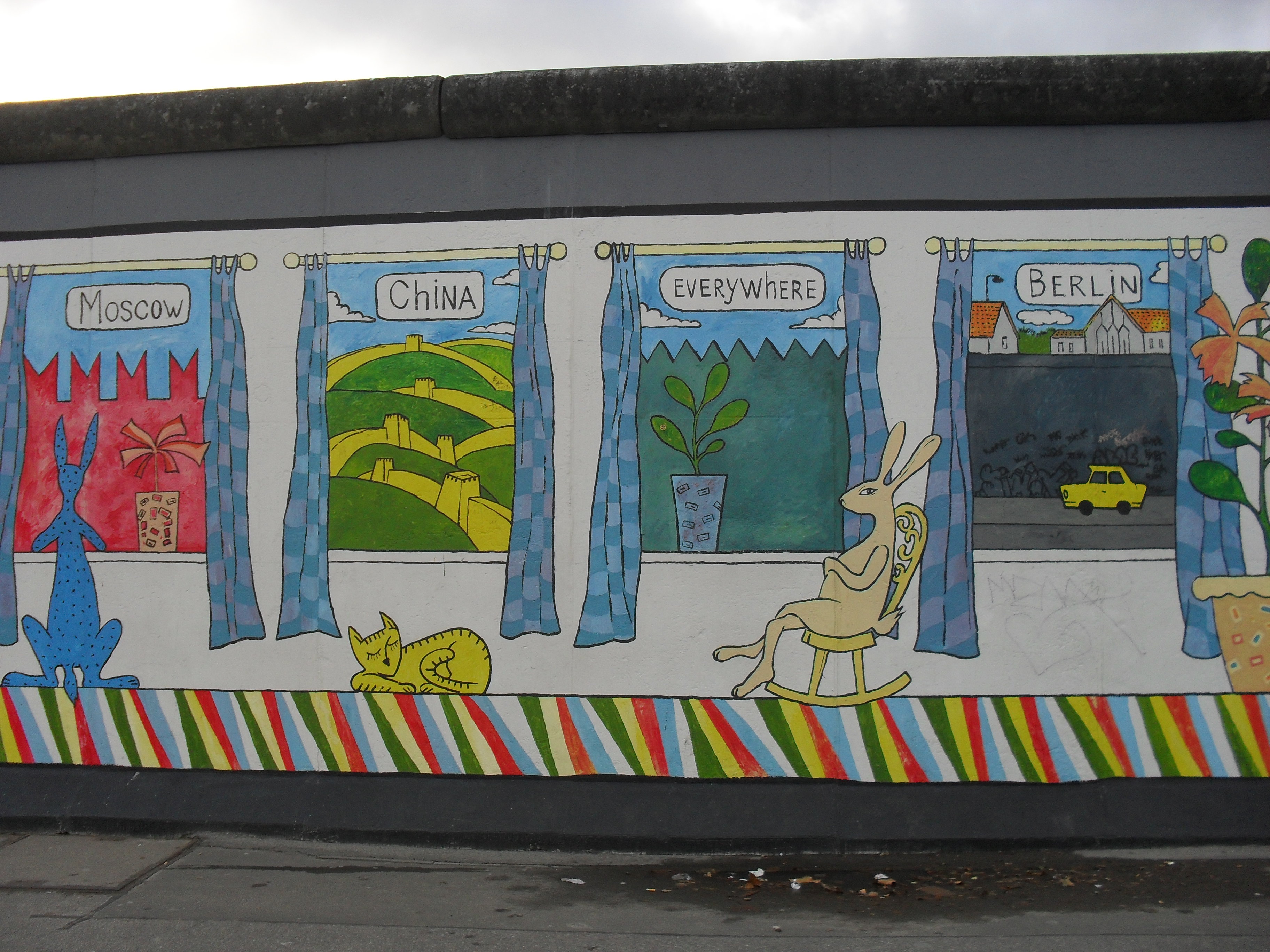 Mountain massif, sunbathed, partly covered in show.