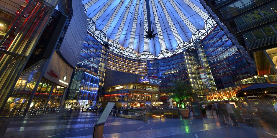 Mountain massif, sunbathed, partly covered in show.